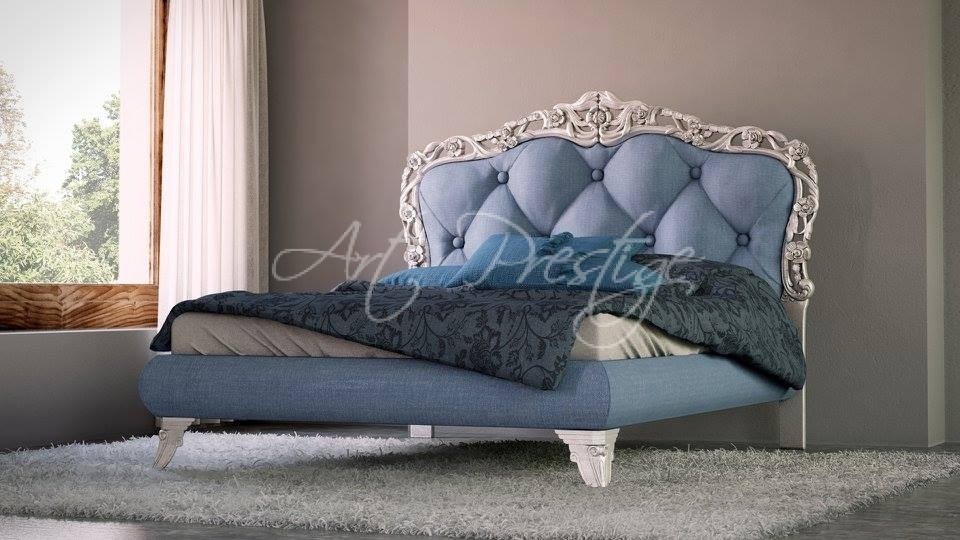 Art.71 Letto matrimoniale testata capitone' cornice intagliata