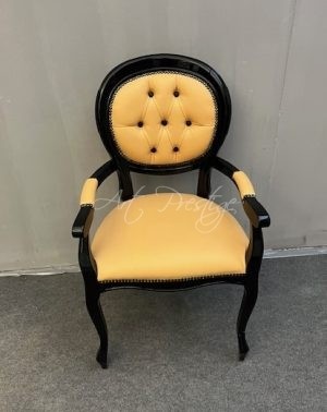 Poltrona laccata nera con ecopelle gialla