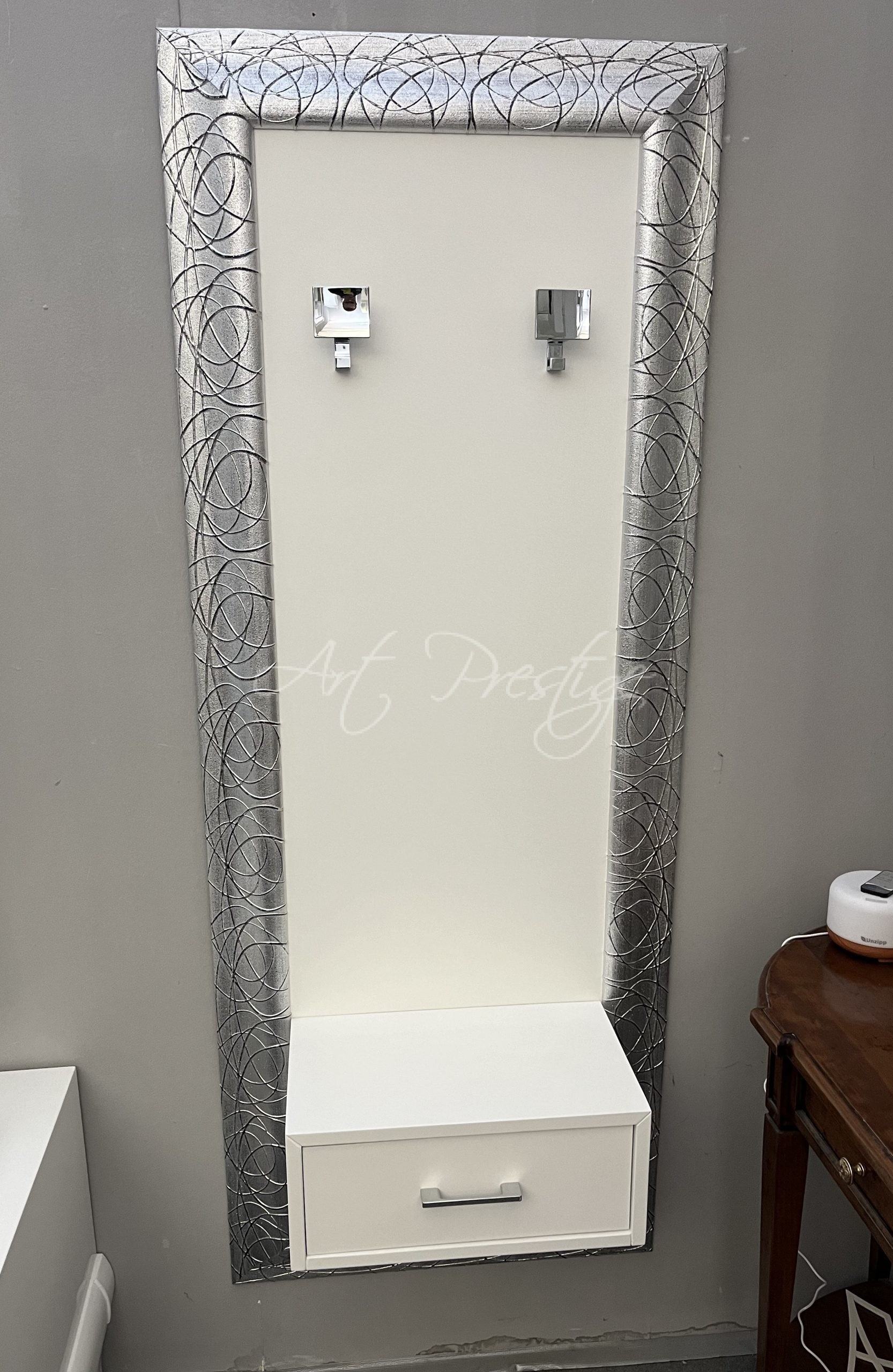 Coat hanger panel with silver frame and drawer